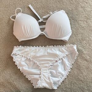 Shade and shore white bikini top is 36C bottoms are a medium